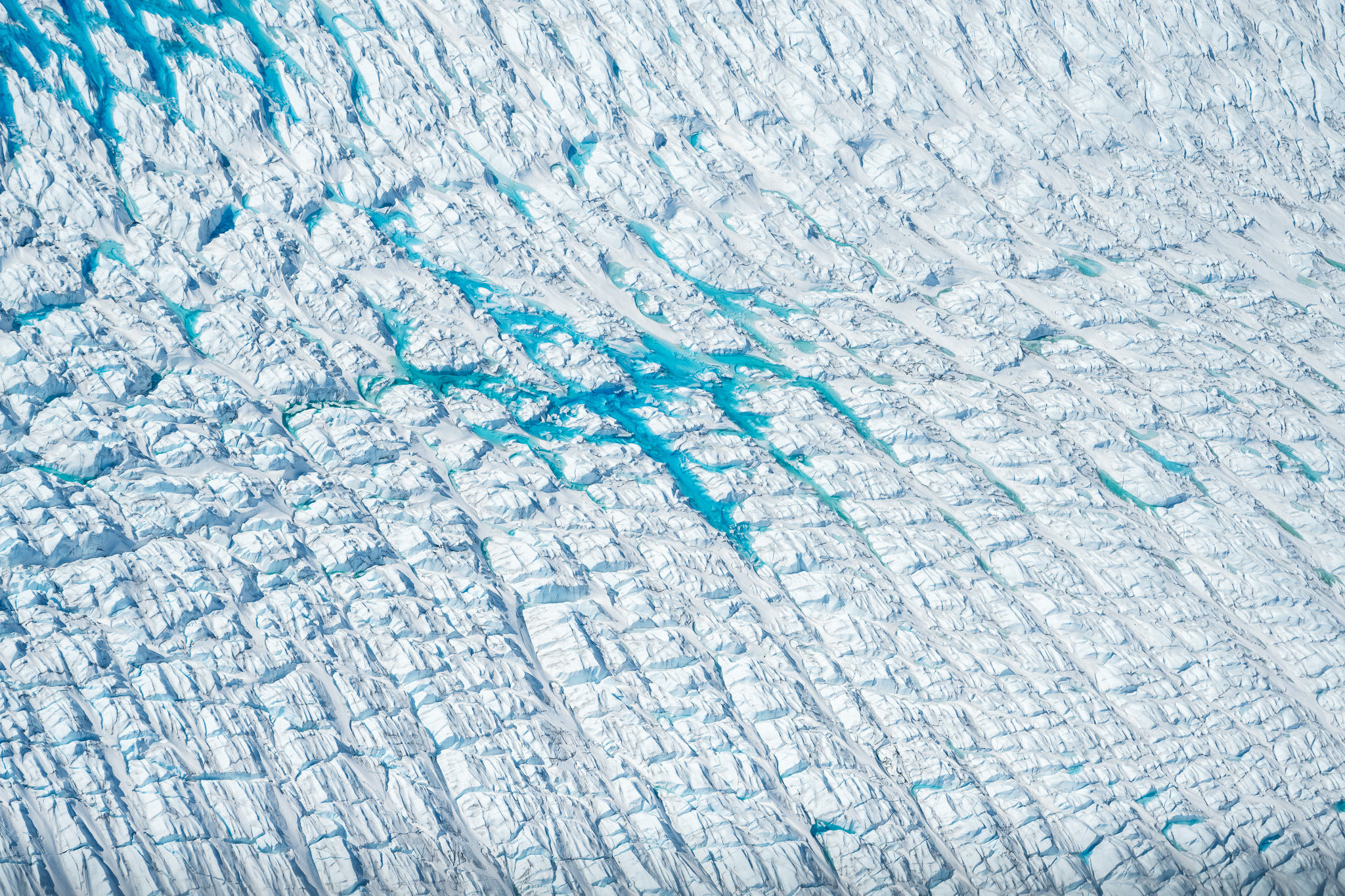 Blue glacier crevasses seen from above